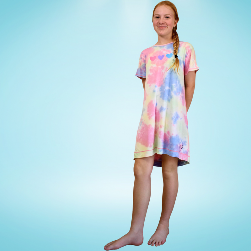 A standing girl wearing the gelato loveheart nightdress  - nightdresses for women and kids - from Comfort on the Spectrum.