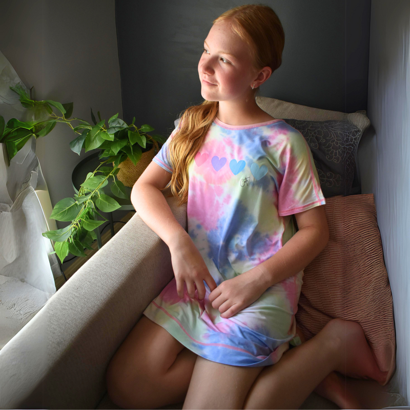 A girl wearing gelato loveheart nightdress  - nightdresses for women and kids - from Comfort on the Spectrum.