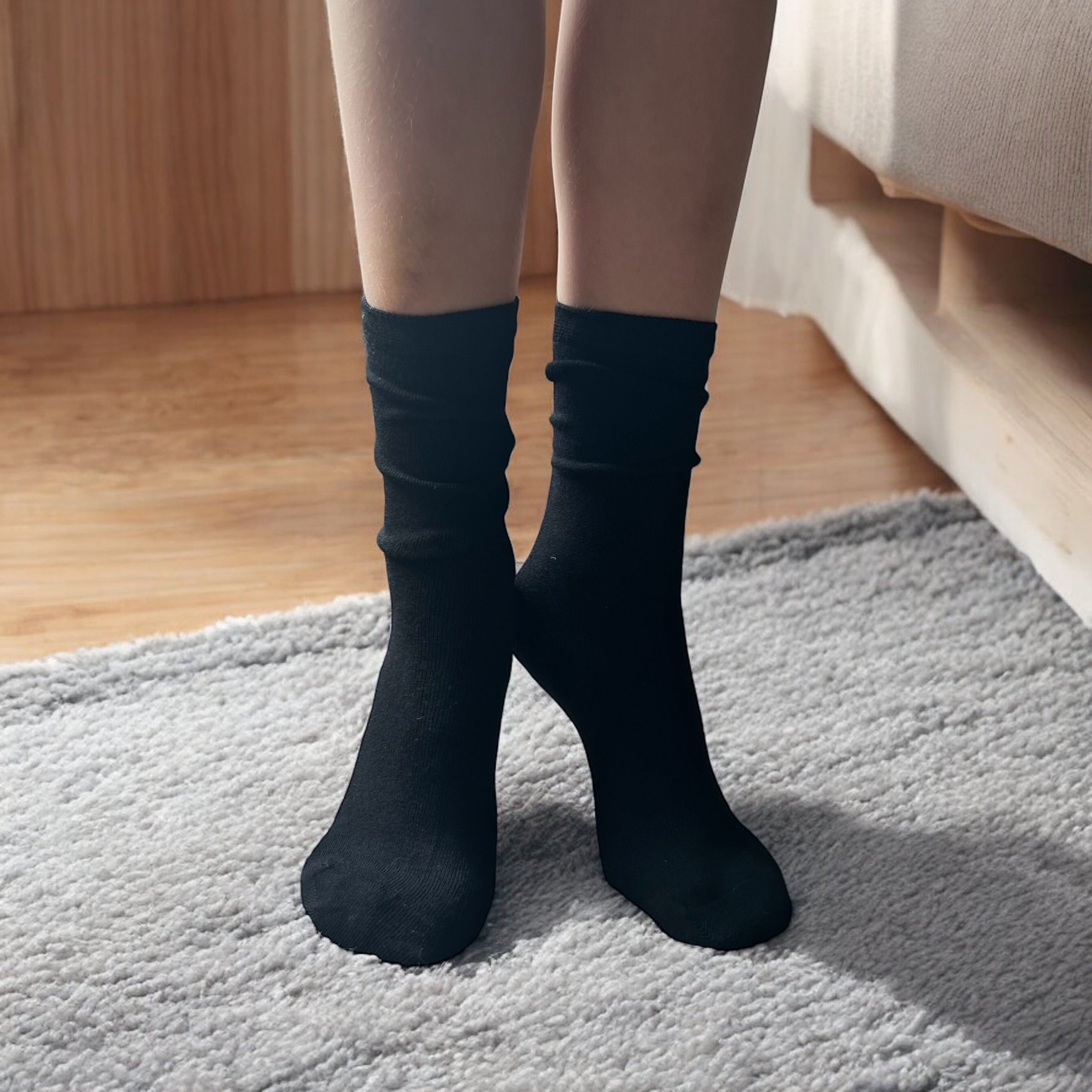 A product photo of black soothe step seamless socks from Comfort on the Spectrum.
