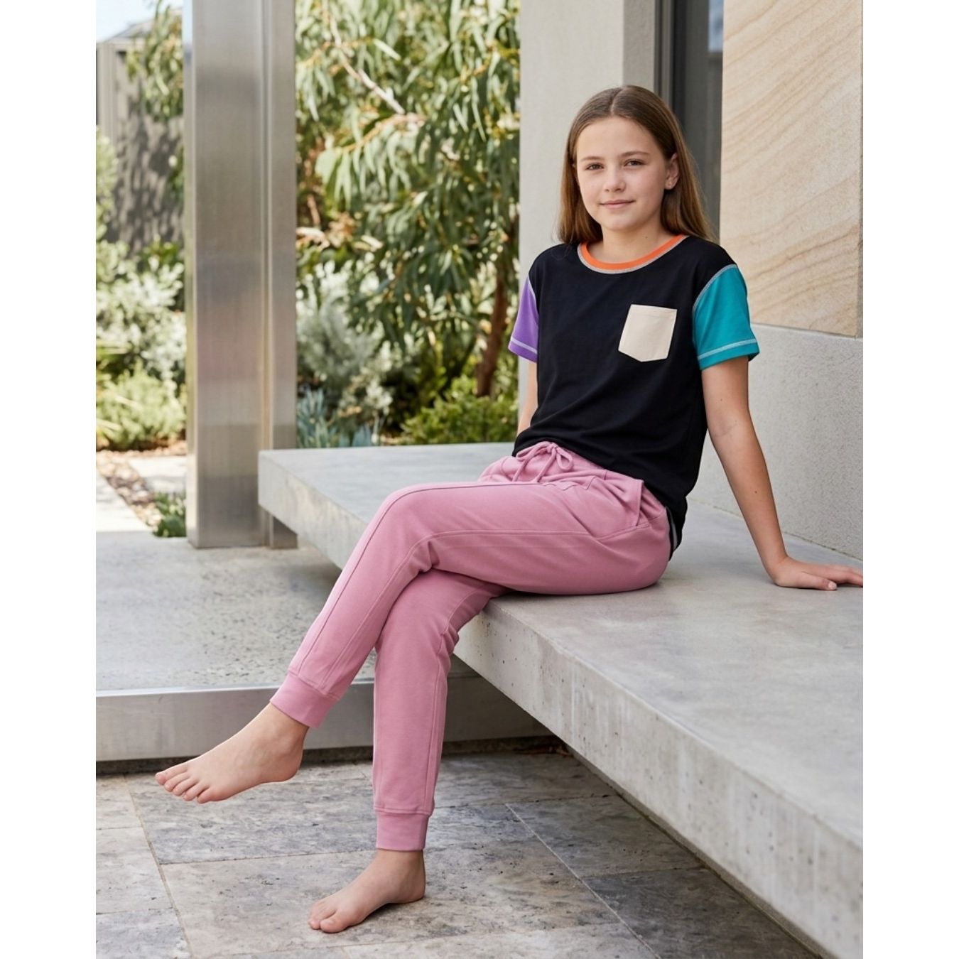 Comfort on the Spectrum kids peony pink bamboo cotton blend tracksuit pants with drawstring waist and cuffed ankles.