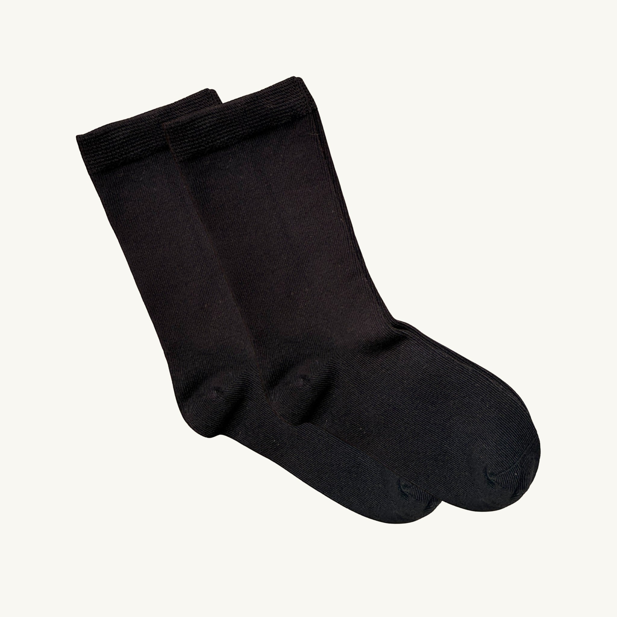 Comfort on the Spectrum black bamboo blend kids sensory socks with seamless toe and non-restrictive top.