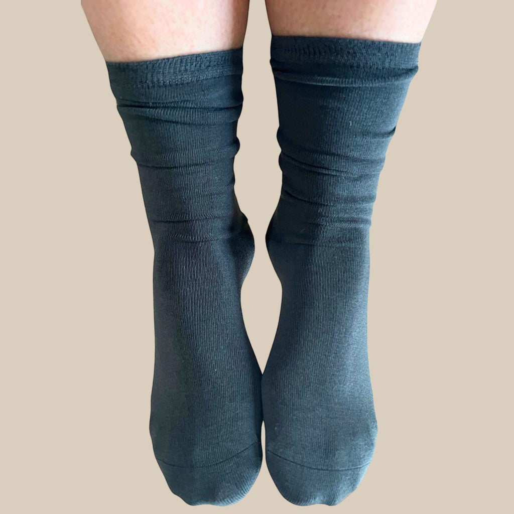 Comfort on the Spectrum Kids Classic Soothe Step™ Sensory Socks - Grey, made from a bamboo/cotton blend with a seamless toe and non-restrictive top.