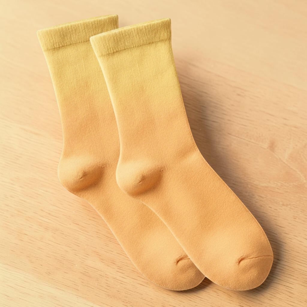 Comfort on the Spectrum Kids Sweet Step Sensory Socks in a tropical twist ombre yellow and orange bamboo blend.