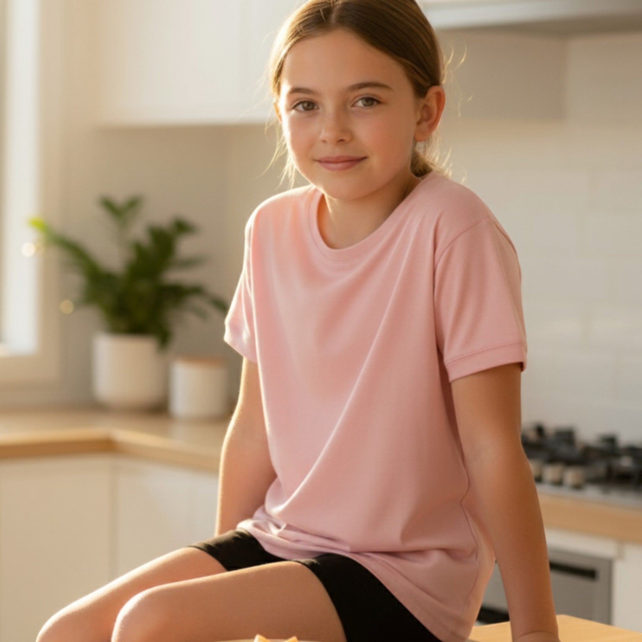 Comfort on the Spectrum light pink bamboo t-shirt for kids, sensory-friendly with flat seams and no tags.