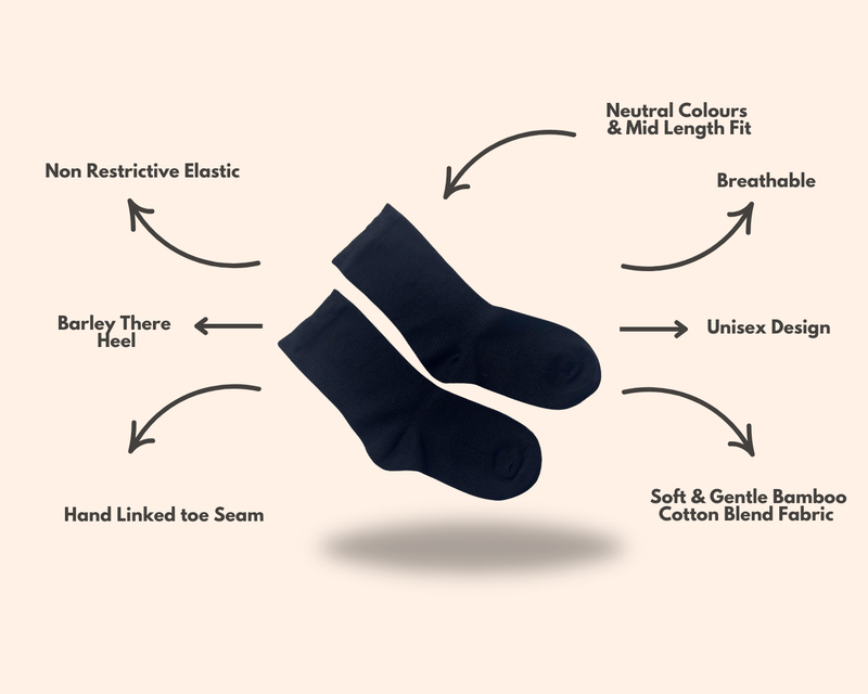 Kids Black Soothe Step Sensory Socks from Comfort on the Spectrum with attached sensory features.