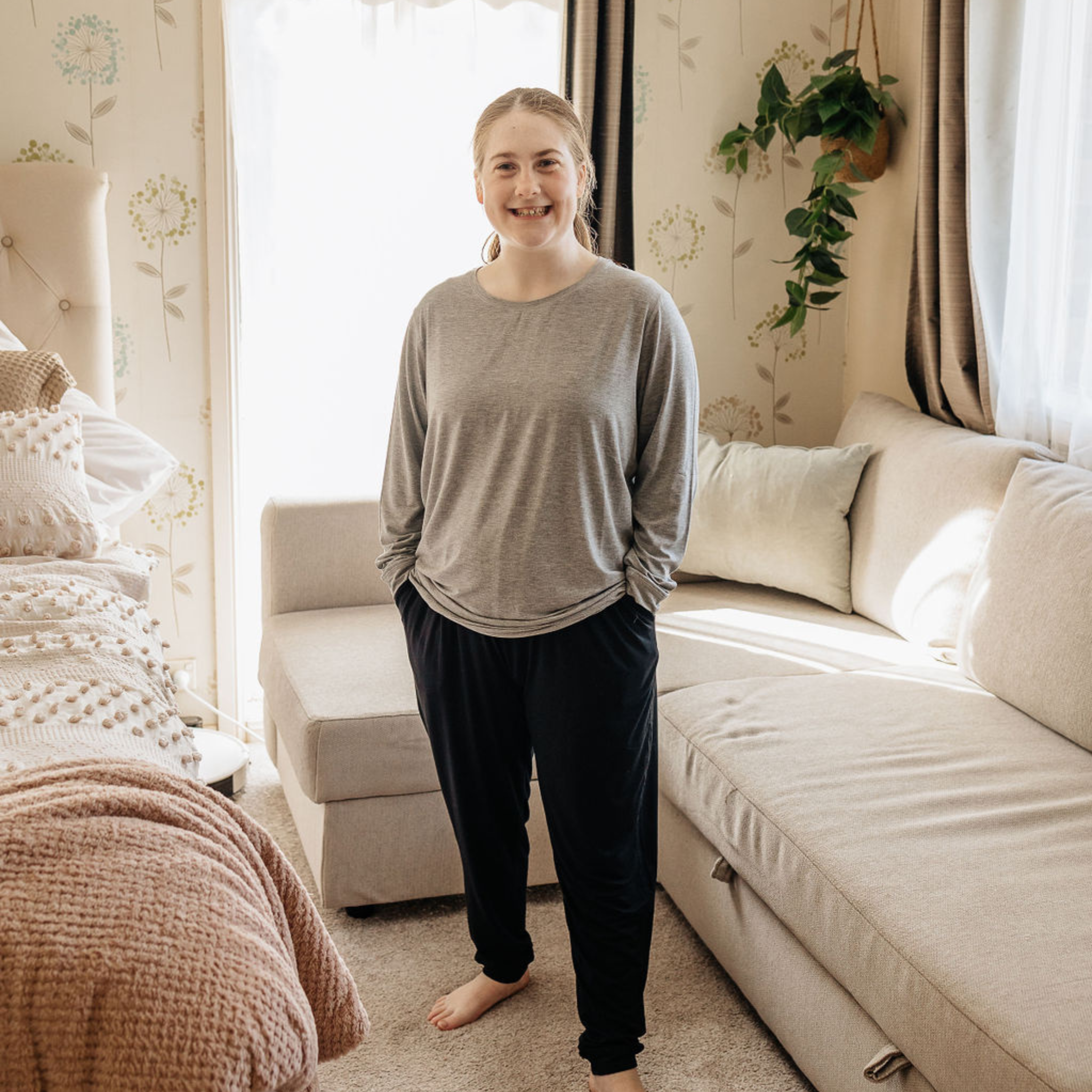 Midnight lounge sensory friendly pants for adults - women and men and Grey Marle Basic Long Sleeve Tops were worn by a standing lady. 