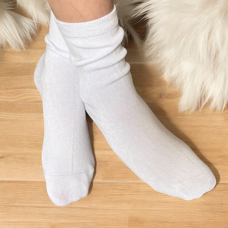 White Seamless Socks named Soothe Step Sensory Socks  for Adults from Comfort on the Spectrum. These 