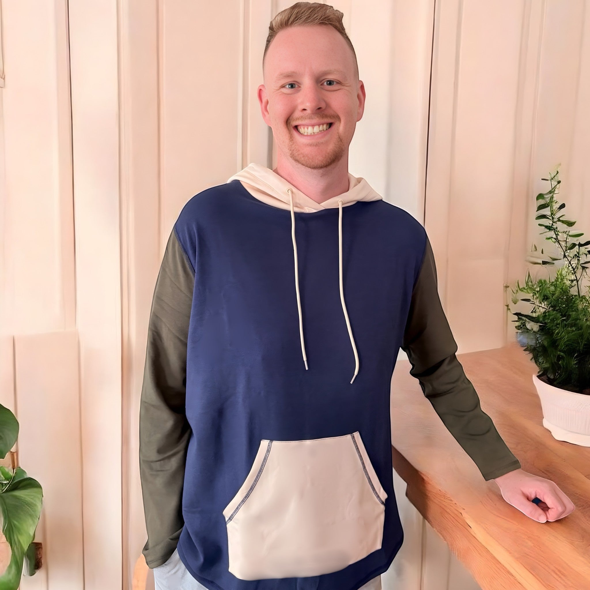 Comfort on the Spectrum Adult Sensory-Friendly Hoodie in navy, olive green, and cream. Bamboo-cotton blend.