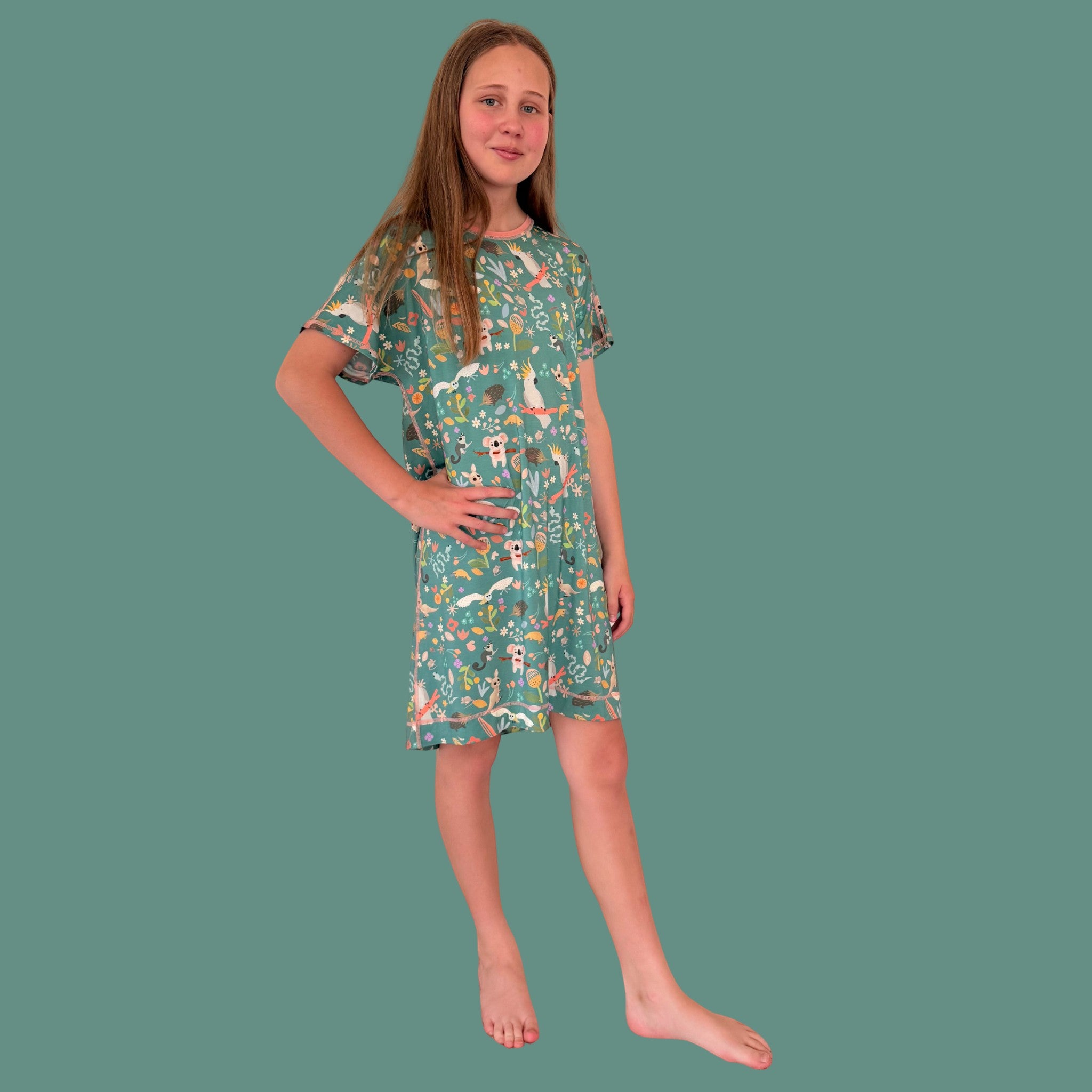 Comfort on the Spectrum Kids Nightdress in Bush Lullaby, green bamboo blend with Australian animal print, relaxed fit, short sleeves.