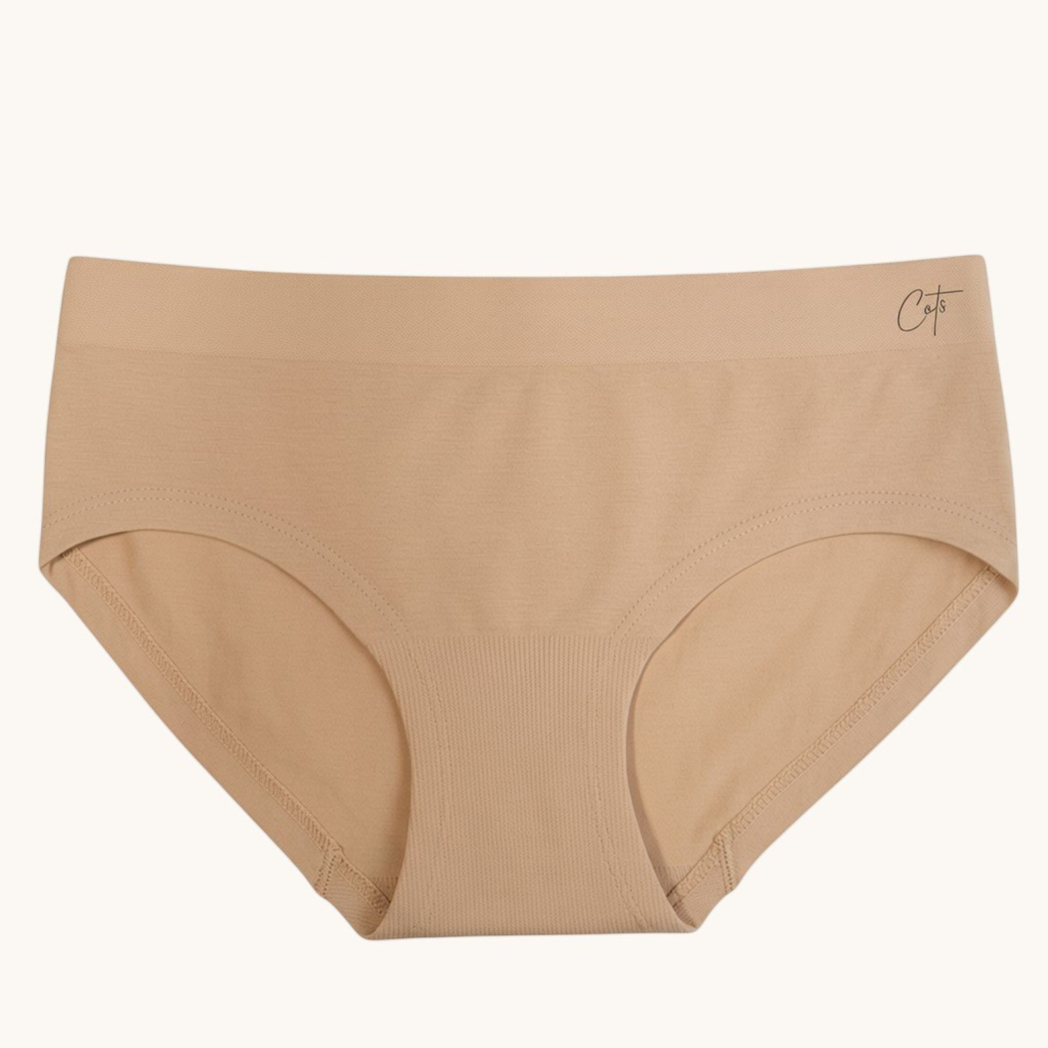 Comfort on the Spectrum nude seamless modal briefs for kids. Tag-free, sensory-friendly design.