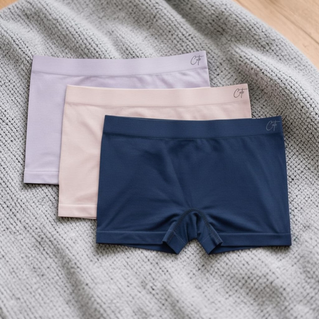 Comfort on the Spectrum Kids SkinSense™ seamless shorty briefs in lilac, petal, and ink. Made from soft, breathable Lenzing™ Modal fabric.