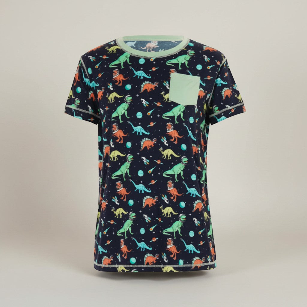 Comfort on the Spectrum navy t-shirt with space dinosaurs, rockets, and planets. Features a light green pocket and trim.