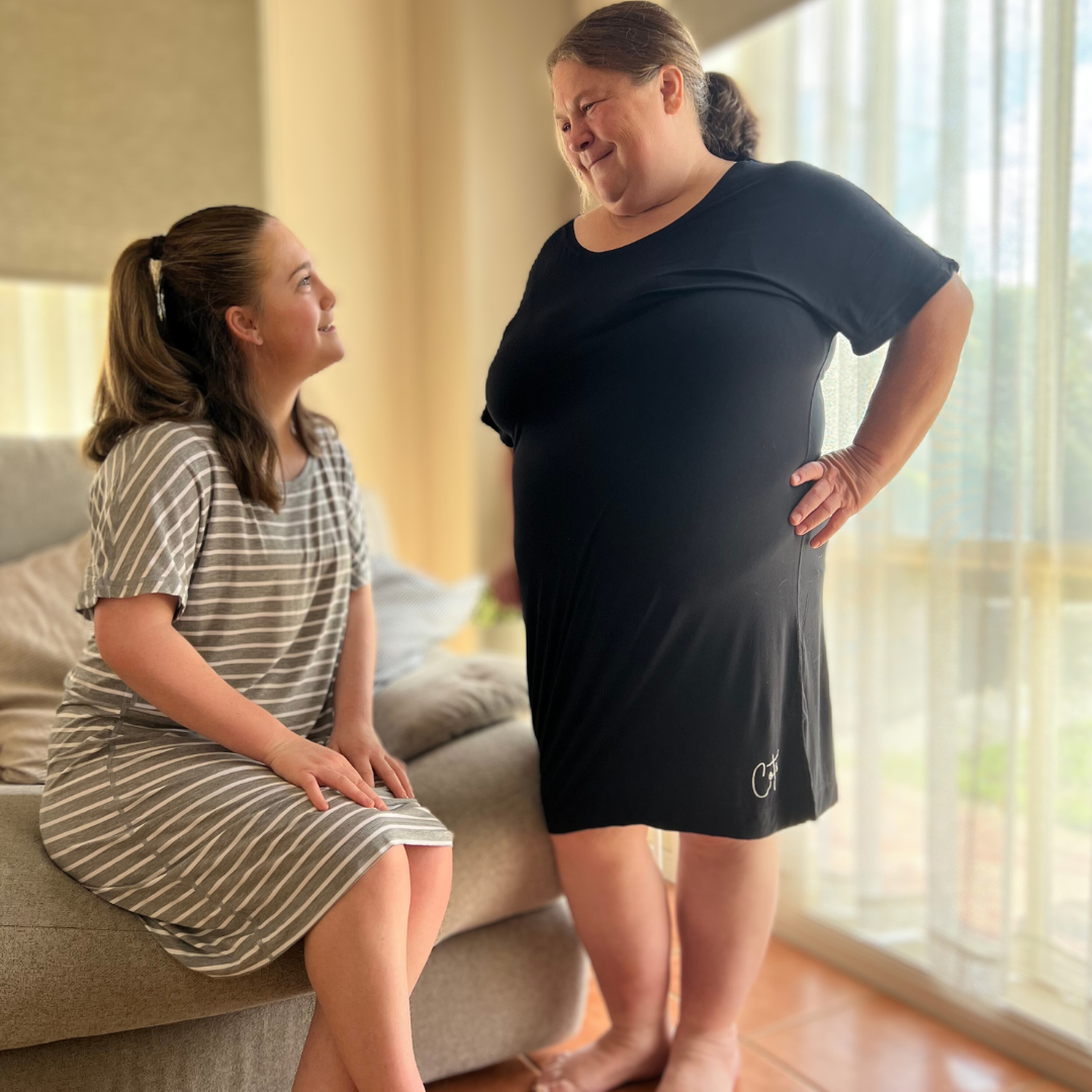 Two women wearing grey stripe and midnight nightdress -  womens bamboo pyjamas australia - from Comfort on the Spectrum.